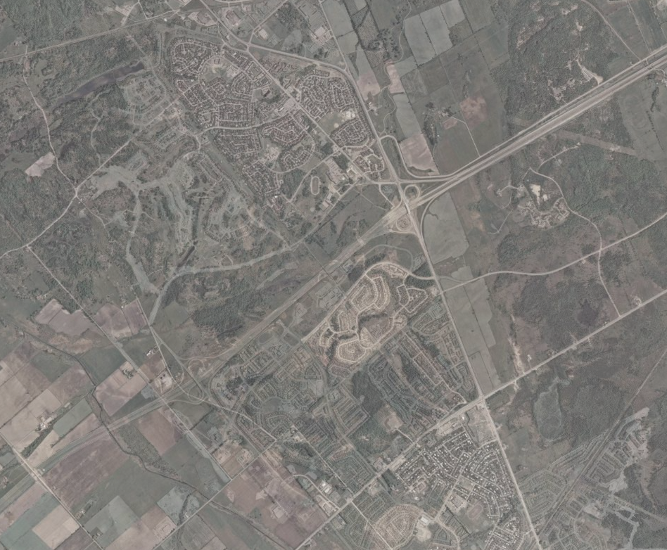 Aerial view of Kanata, Ontario, circa 1979–1980, showing early suburban development and surrounding farmland. Source: City of Ottawa GeoOttawa.